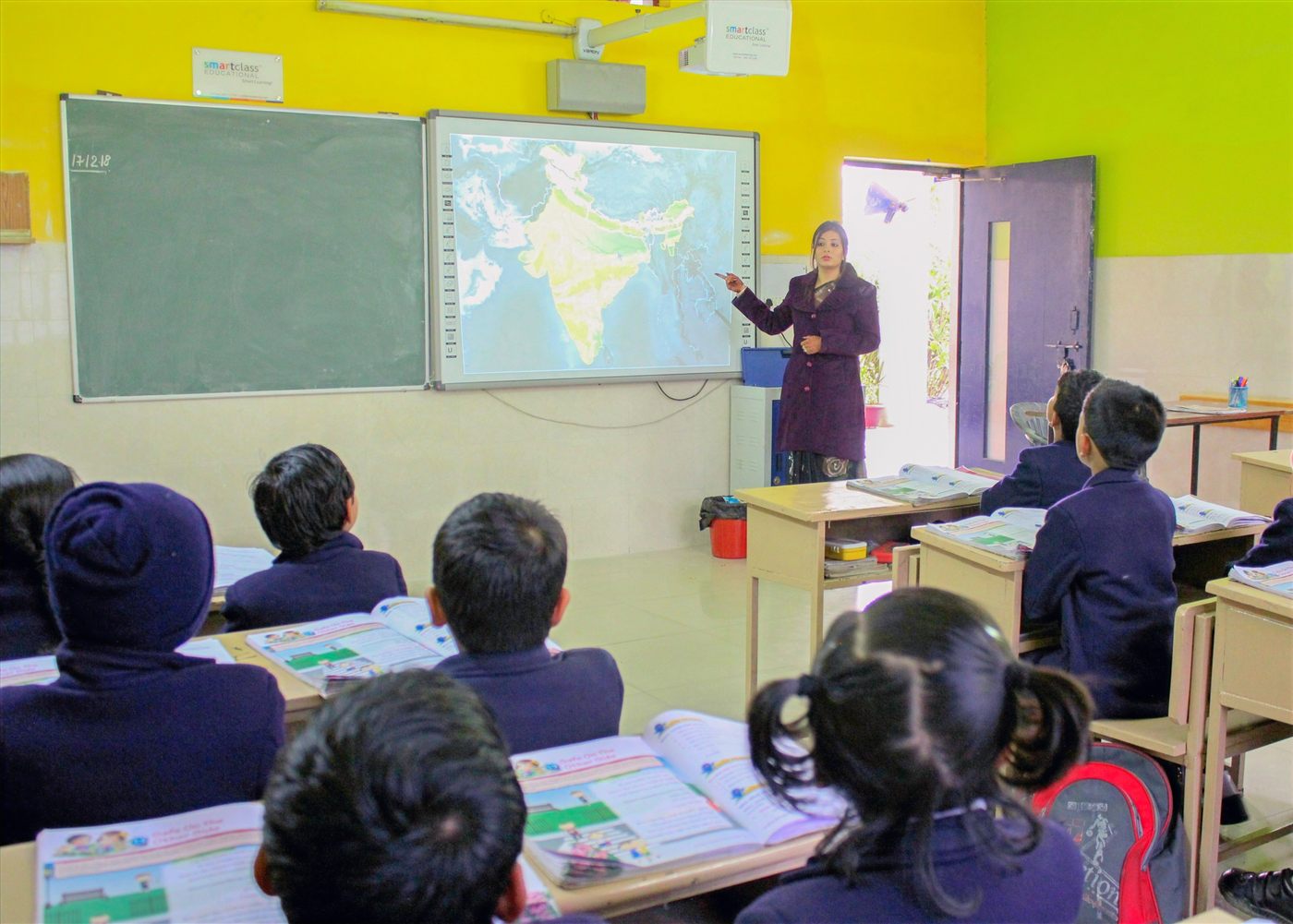 Junior school class with interactive smart board at Scholars' Home