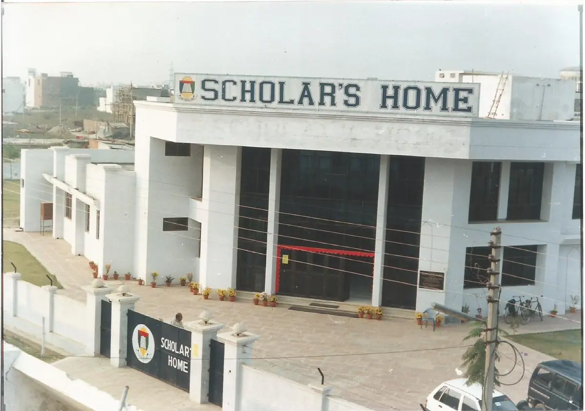 The first campus — note the original spelling on the sign