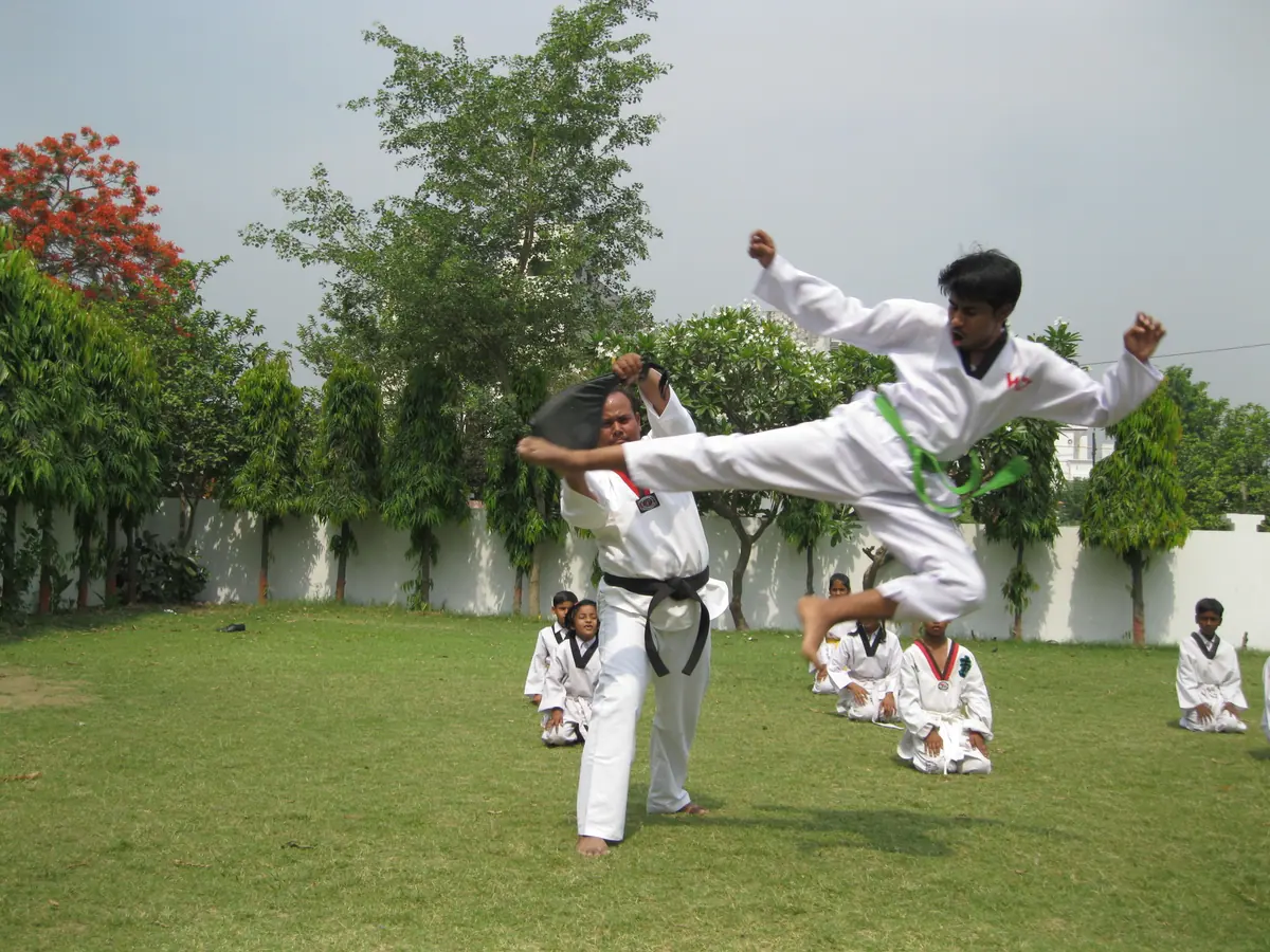 A flying kick at a karate demonstration