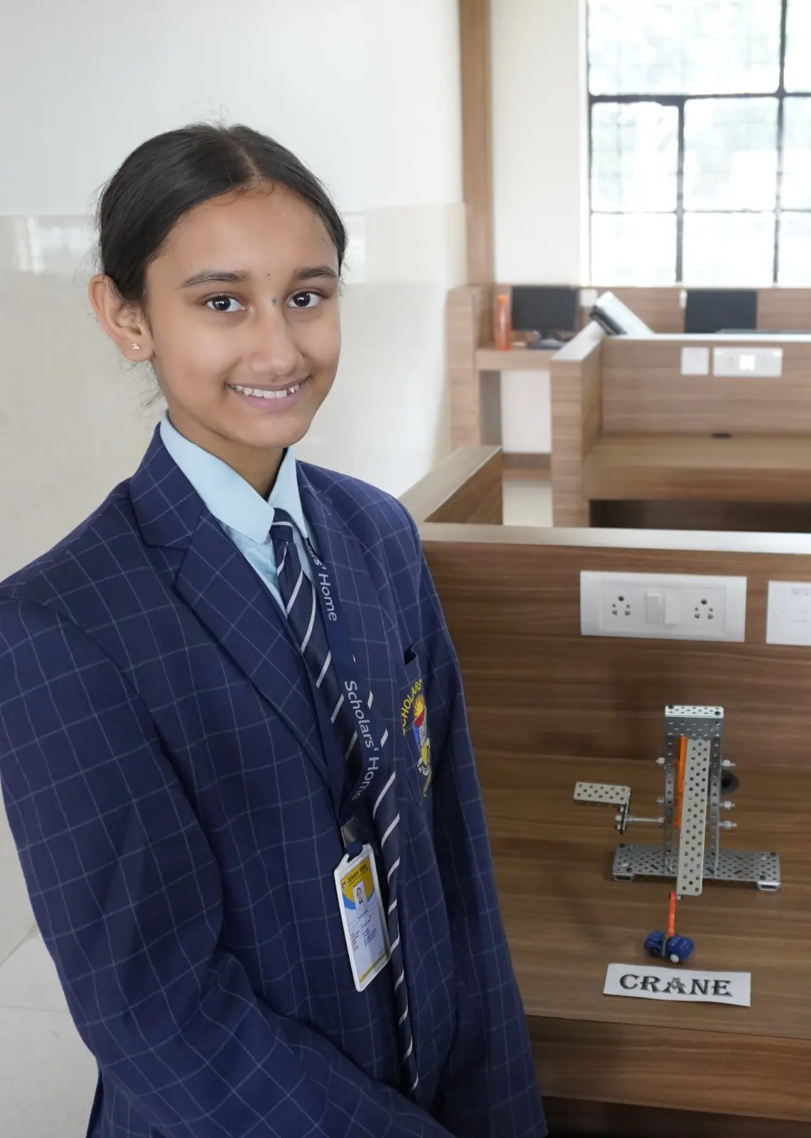 A senior student of Scholars' Home in the school blazer