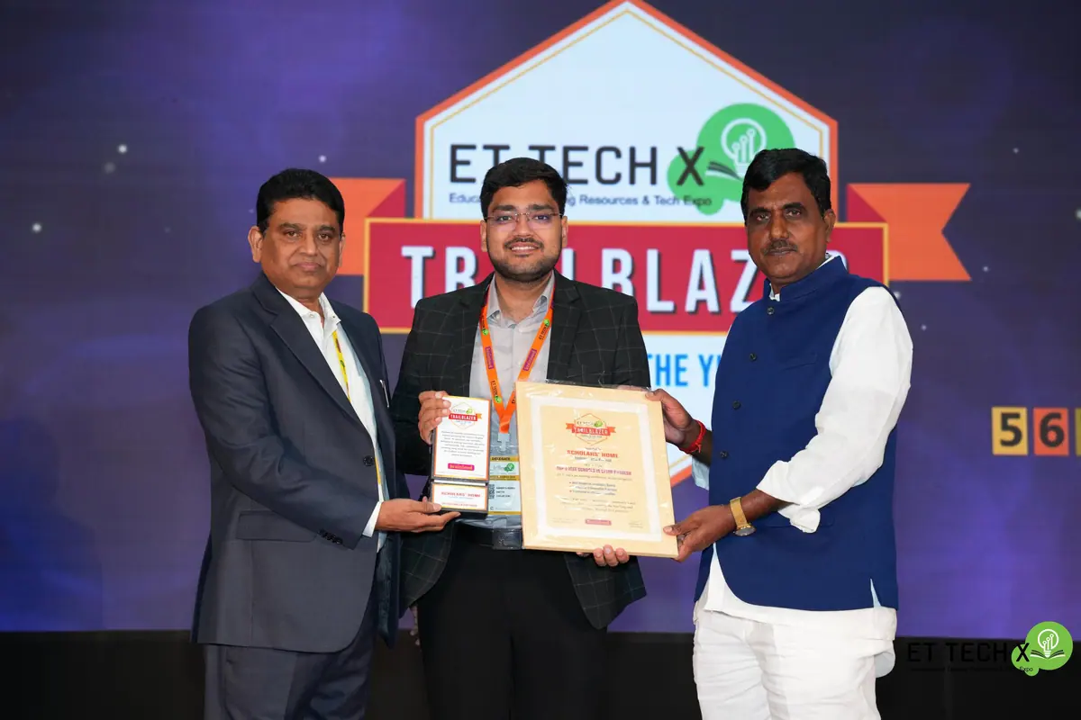 Scholars' Home receiving the ET TECH X School Excellence Awards