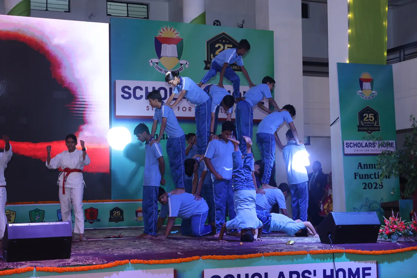 A karate display on the Annual Function stage